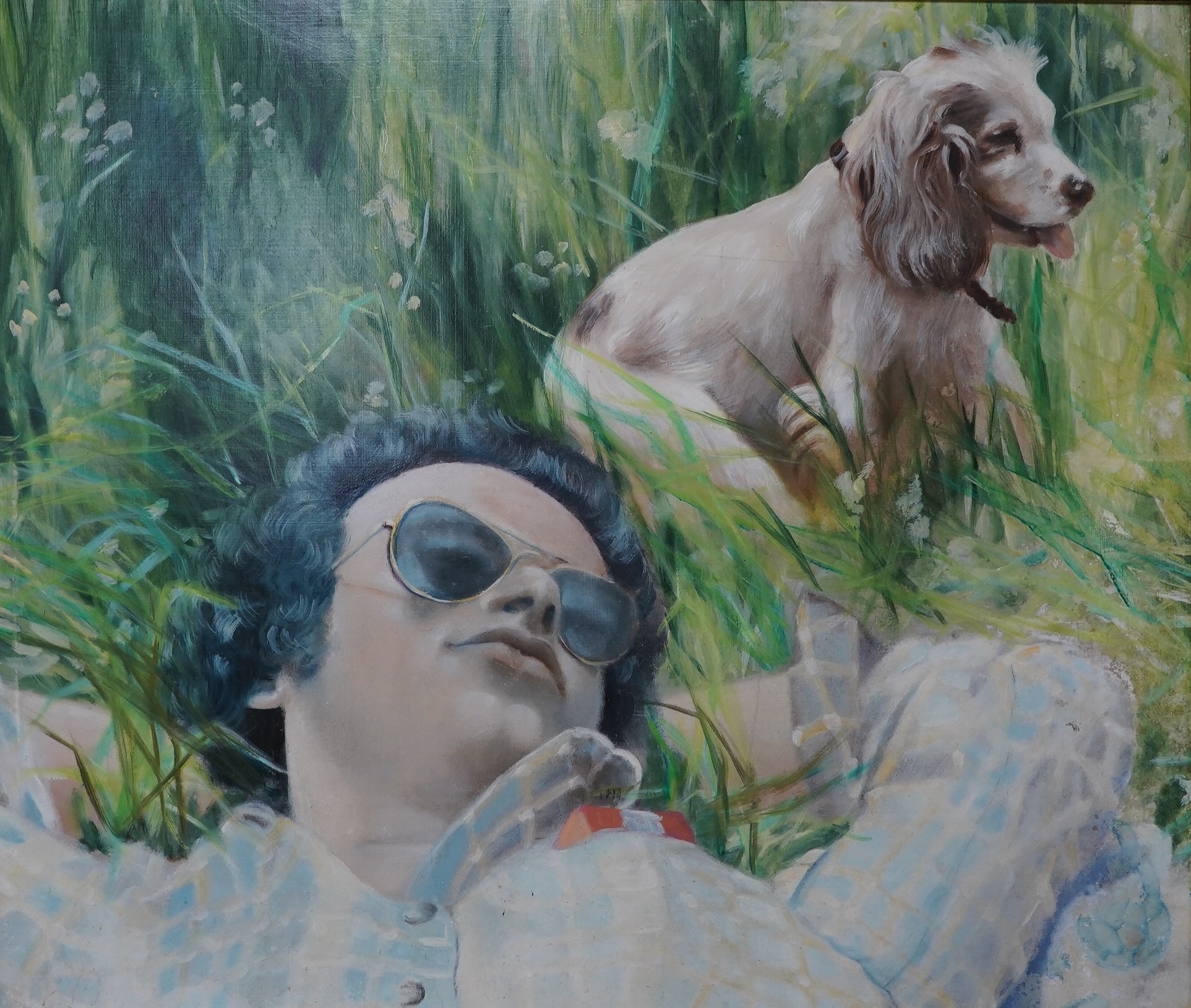 20th century, English School, oil on board, Figure lying in grass beside a dog, unsigned, 51 x 60cm. Condition - good